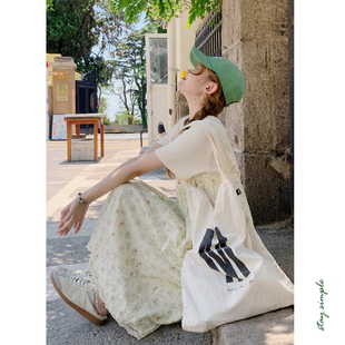 夏吊带连衣裙宽松碎花裙 花吉Q493米黄色碎花蕾丝边吊带裙2026新款