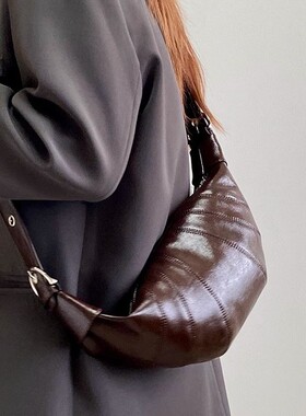 MK DA女包2025新款韩版复古可颂牛角包高级感真皮单肩斜挎饺子包