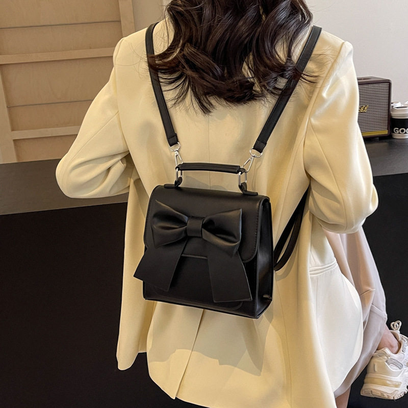 小众设计感蝴蝶结女包2026新款洋气简约手提单肩斜挎双肩多用背包