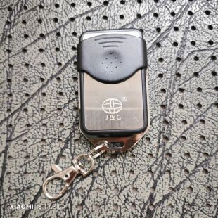 巨光JGZ-390B-T8手柄遥控器发射器YYT-600B遇阻电机卷帘门钥匙390