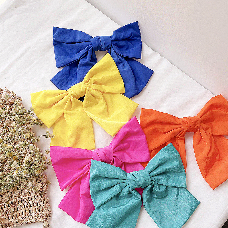 网红明星橘色飘带蝴蝶结弹簧头饰