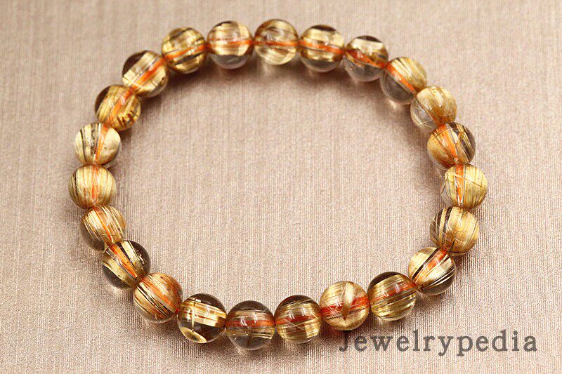 【jewelrypedia】天然8mm高品质板钛金发晶水晶手链,带猫眼效应