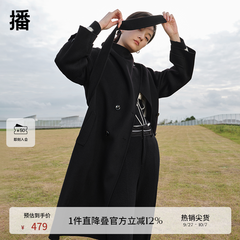 不对称中长款大衣播设计感