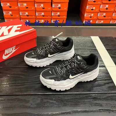 耐克黑橙女子复古运动老爹休闲鞋