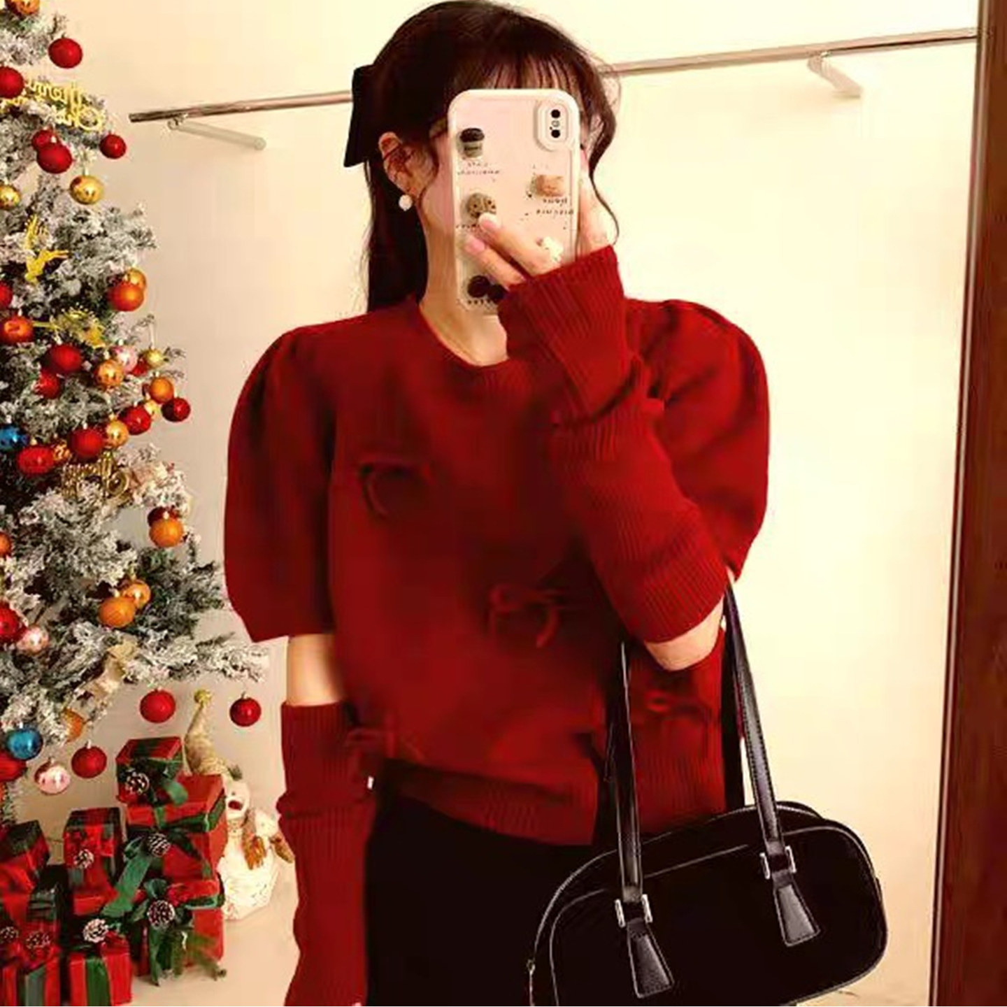欧洲站2025冬季新款女时尚洋气蝴蝶结拼接袖套羊毛针织衫红色毛衣