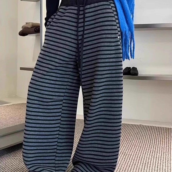 胖妹妹宽松休闲显瘦弯刀长裤