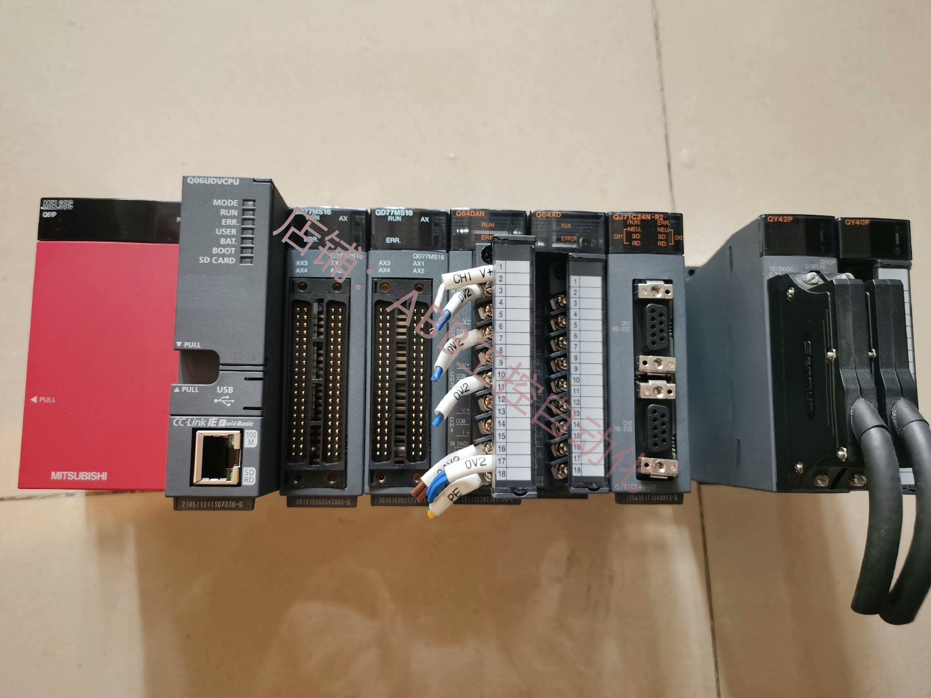 一套三菱plc模块 q06udvcpuqd77ms16q64danq64adqj71c24n-r2等整