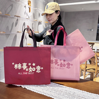 高档无纺布袋服装店用衣物加大女手提袋子购物礼品包装袋定制logo