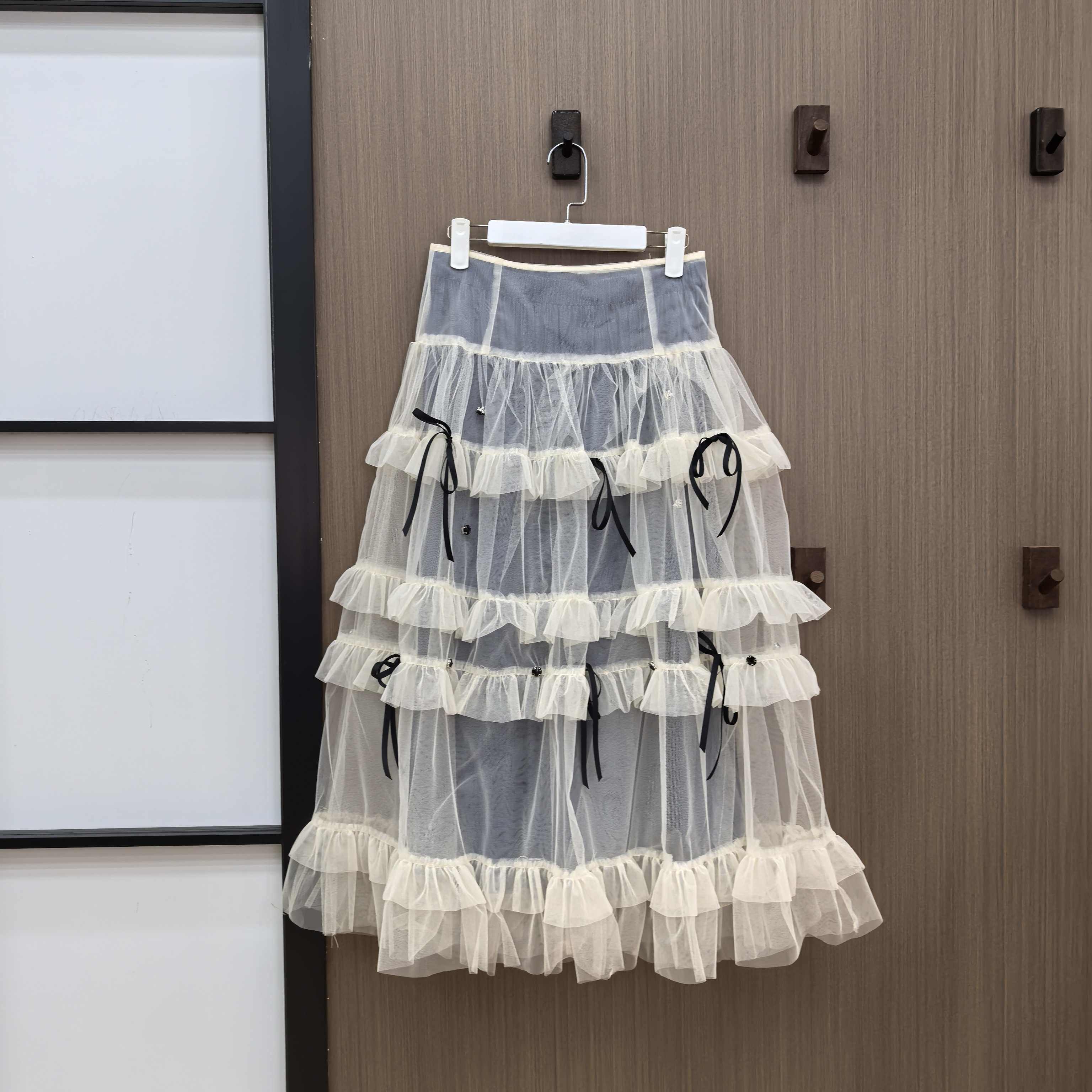 周美美 少女异想网纱荷叶边蝴蝶结钉钻叠穿两件套半裙