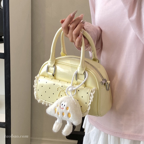 韩系甜美蝴蝶结波点手提斜挎包