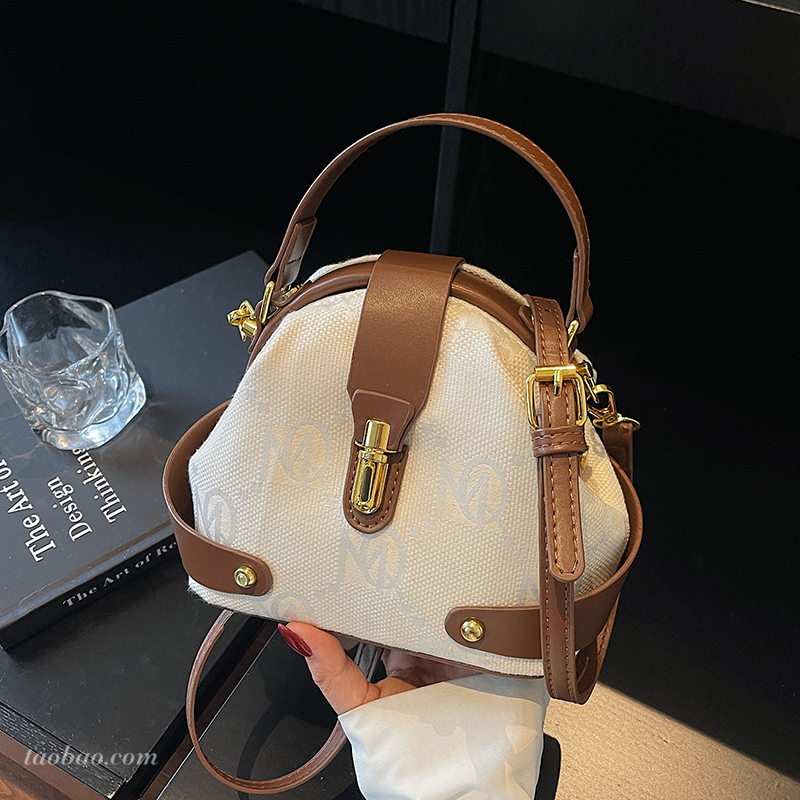 高级质感帆布水桶包包女