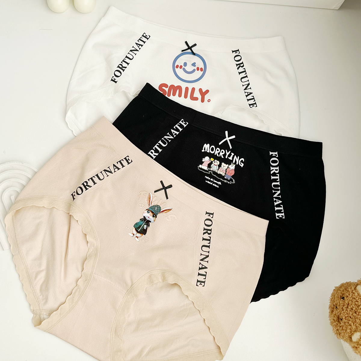 莫代尔60支裸氨无缝内裤无痕亲肤柔软马卡龙色中腰提臀少女三角裤