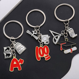 欧美跨境热销滴油尺子钢笔100分A+博士帽毕业季钥匙扣背包挂饰