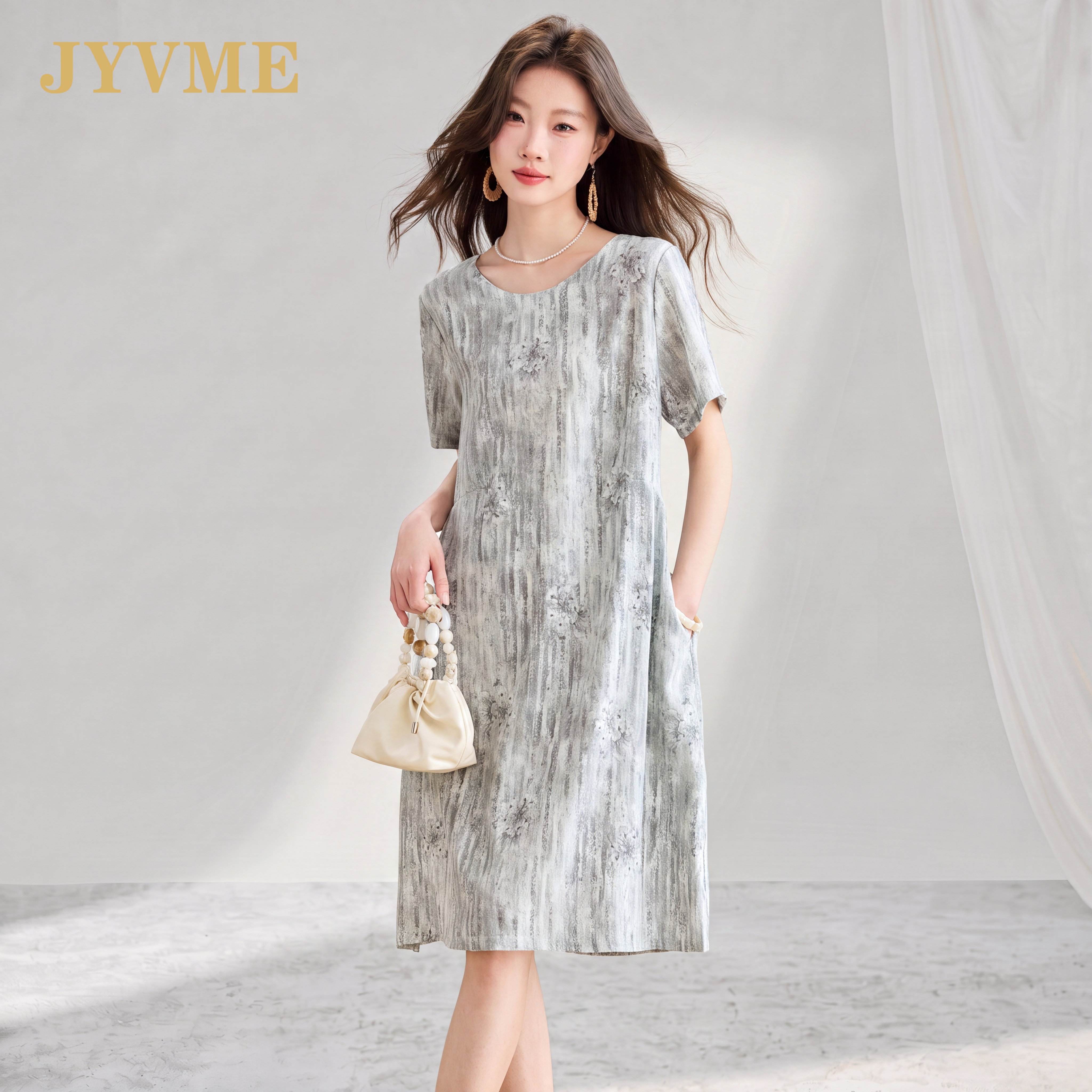 JyVme轻奢高端天丝亚麻连衣裙女2026新款显瘦夏季短袖印花中长裙
