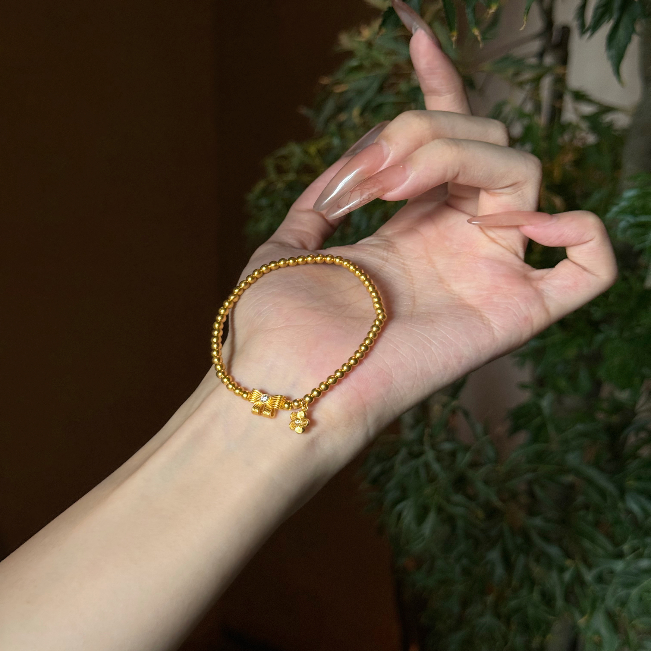 足金999水贝黄金蝴蝶结花瓣手链