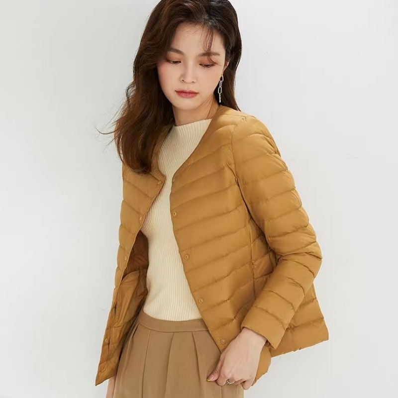 唯品会特卖断码清仓特价处理轻薄白鸭绒羽绒服女装品牌正品春秋冬