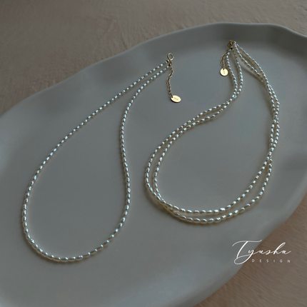 TYUSHA 稀有强光天然小粒珍珠项链女14K包金叠戴锁骨链轻奢毛衣链