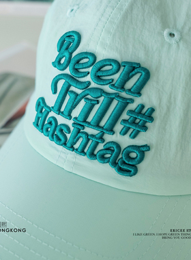 好精致的刺绣。薄荷绿色的干爽速干面料的棒球帽，刺绣可调节帽子