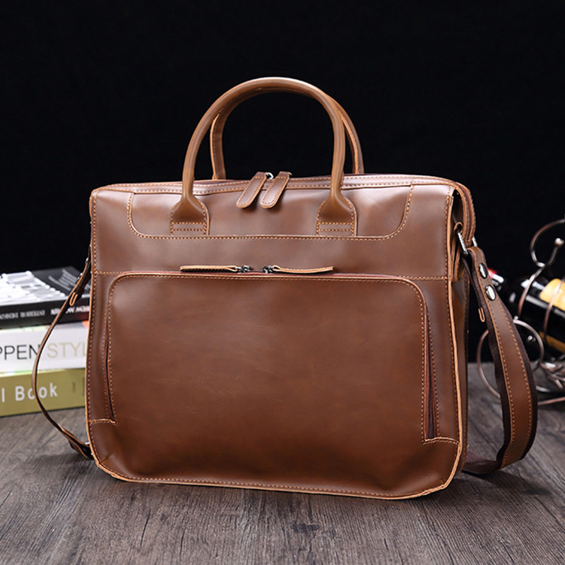 THE NEW CRAZY HORSE PATTERN PU LEATHER BUSINESS BRIEFCASE RETRO MENS BAG 14 INCH LAPTOP BAG IS A HOT MODEL