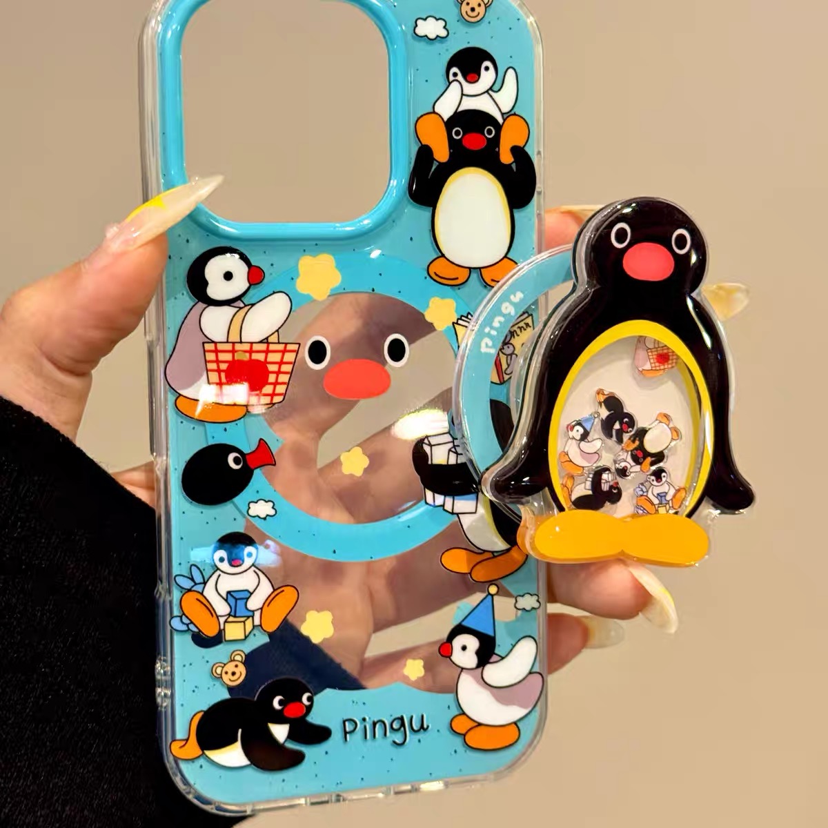 可爱泼墨小企鹅摇摇乐磁吸支架适用iPhone15promax苹果14手机壳13pro防摔1211女16promax全包xsxr创意78plus