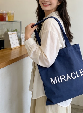 藏蓝色字母帆布包女大容量单肩包手提托特包通勤包学生补习装书包