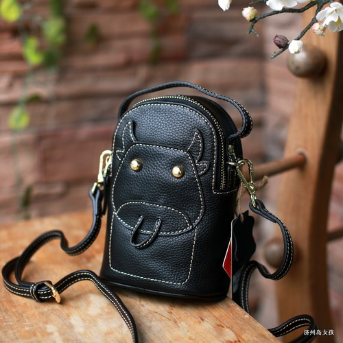 藏皮客单肩斜挎包可爱小牛小包