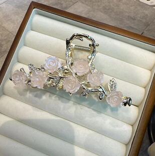 Lacquered diamond-encrusted clutch for sophisticated ladies