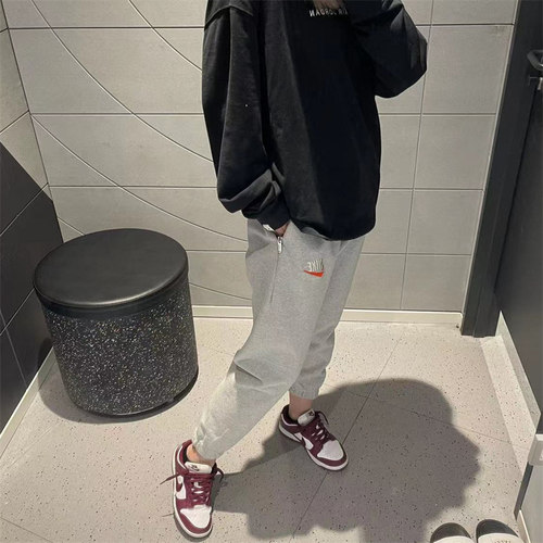 Nike/耐克男休闲运动收脚长裤