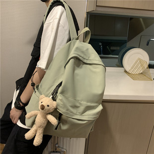 纯色双肩包女初中高中学生校园书包男女休闲百搭大容量电脑背包男