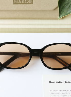 白色框板材猫眼墨镜女款2025新款高级感防紫外线太阳眼镜