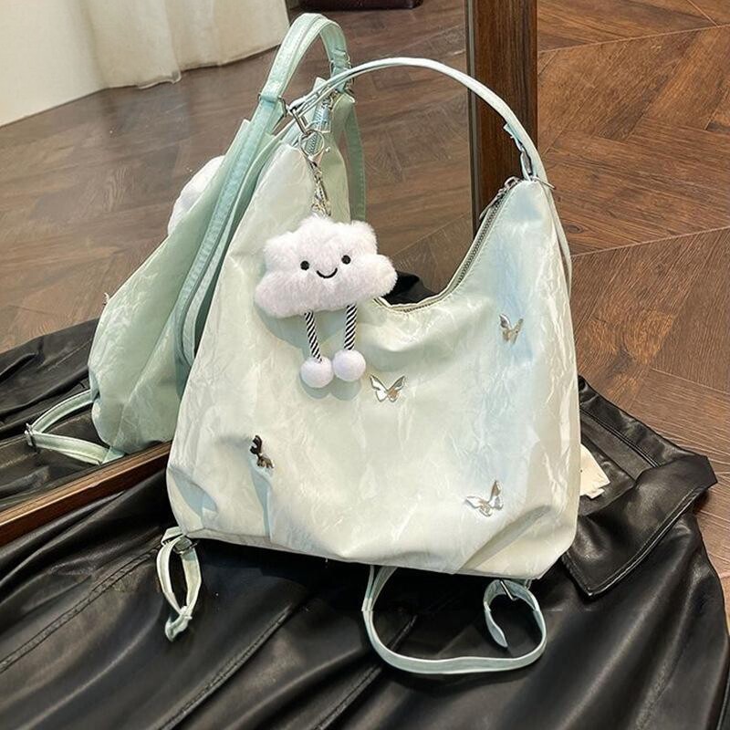 都市简约托特包女2026新款大容量通勤单肩包时尚度假风斜挎背包潮