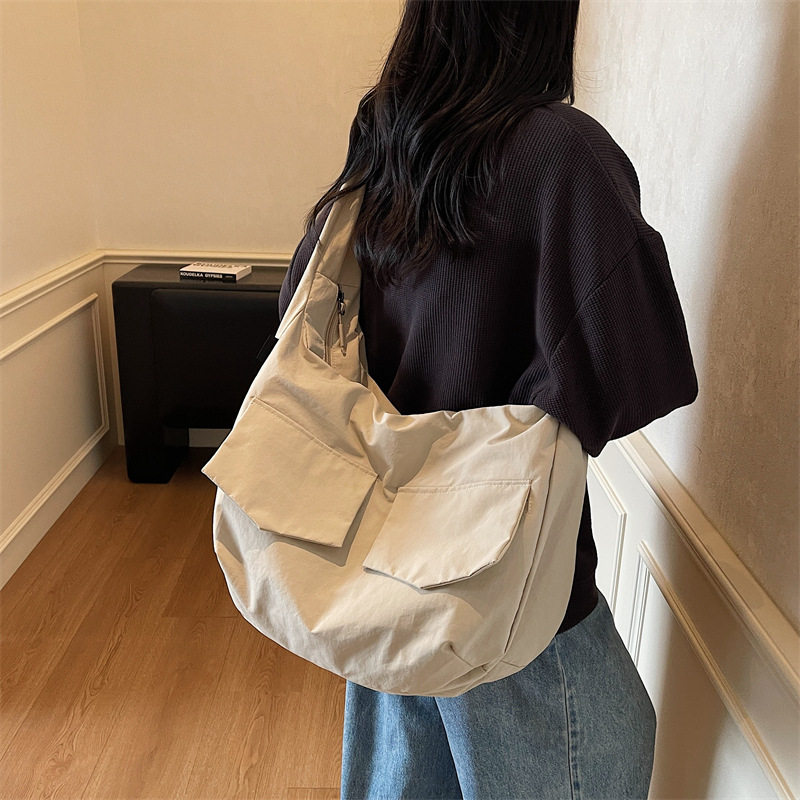 韩系大容量斜挎包包女帆布包休闲百搭通勤托特包慵懒风简约单肩包
