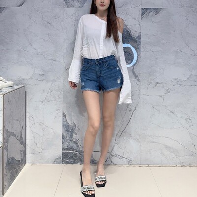 国内现货 Nobody Denim 高腰中蓝色破洞阶梯毛边显瘦牛仔短热裤女