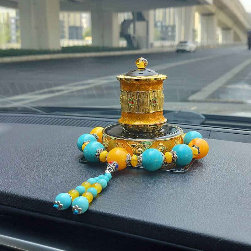 2024新款高端汽车内饰太阳能永转动金属装饰品藏式车载高级感摆件