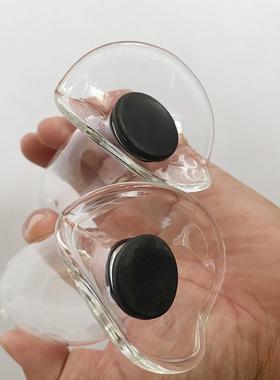 A self-pleasuring toy made of glass for use inside the anus.