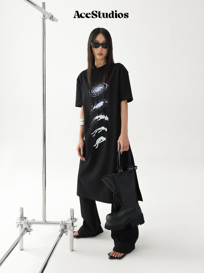 Black oversized graphic T-shirt dress worn by a model