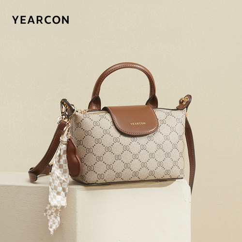 意尔康饺子包印花撞色复古休闲