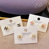 Little Daisy白陶瓷高级感简约气质轻熟女精致氛围 H耳钉银针耳饰