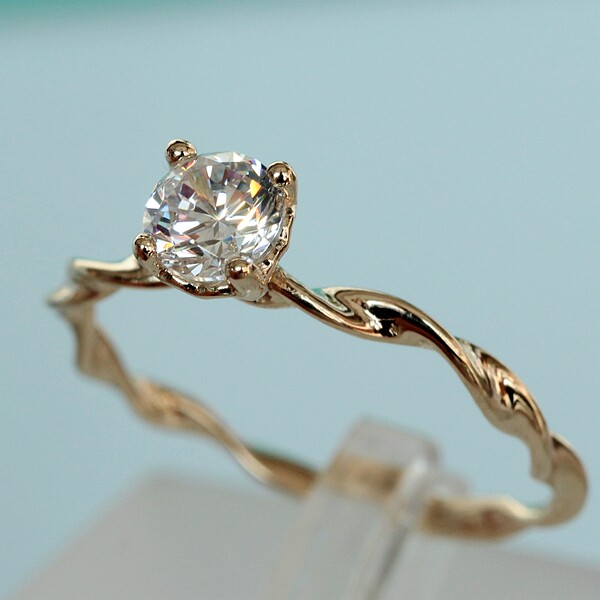 订货兔兔韩国14K黄金戒指女 大波浪扭花桃心四爪托半克拉钻托漂亮