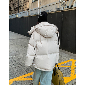 白鹅绒羽绒服女冬季2024新款独特超好看高级感短款情侣加厚工装男