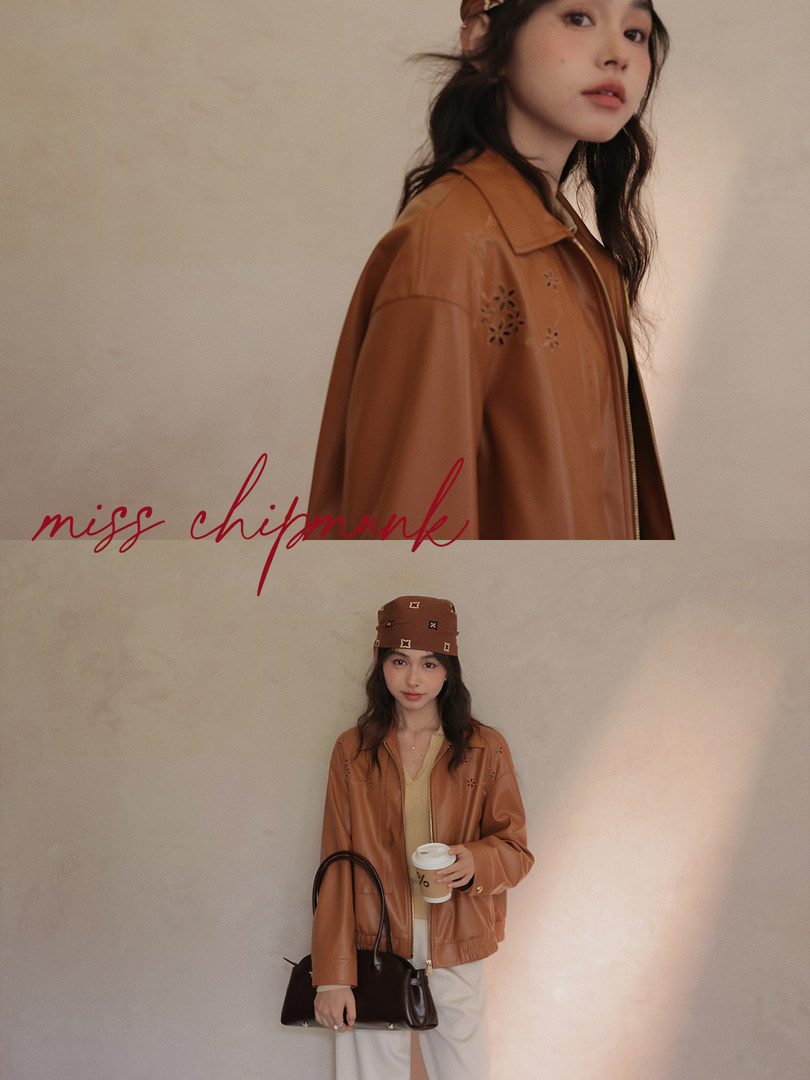Woman wearing a brown jacket with a handbag in a fashion promo image