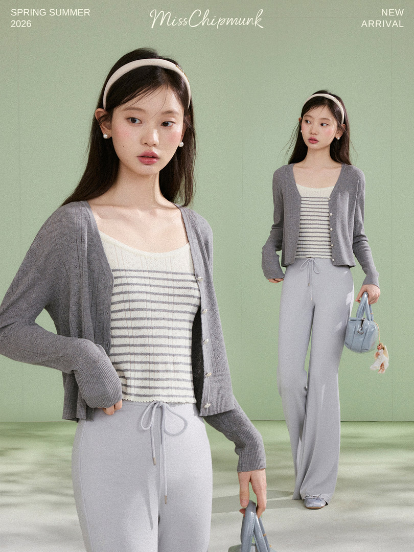 Model wearing a gray cardigan over a striped camisole top with light drawstring pants