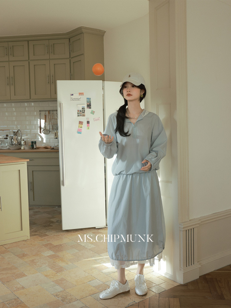 Light blue casual two-piece outfit worn by a model