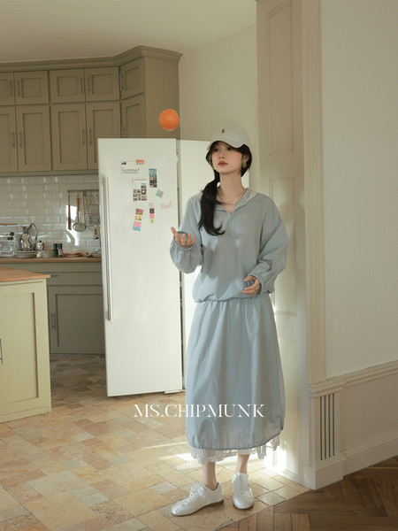 Light blue casual two-piece outfit worn by a model