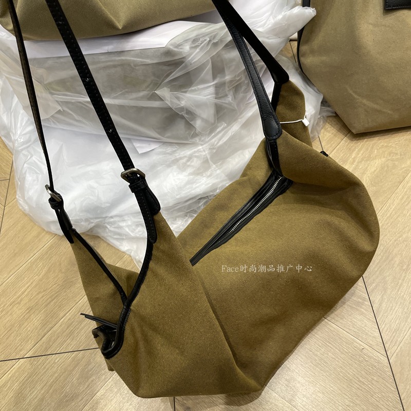 小众原创单肩斜挎帆布搭配头层牛皮离家出走包