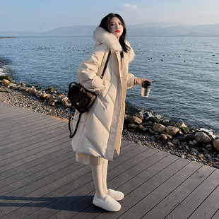 潮牌女中长款冬季新款韩版宽松加厚面包服米米白色大毛领连帽羽绒