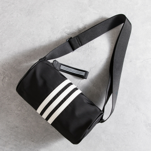 韩版时尚男女圆筒包个性百搭简约手机包小众条纹小挎包休闲斜挎包