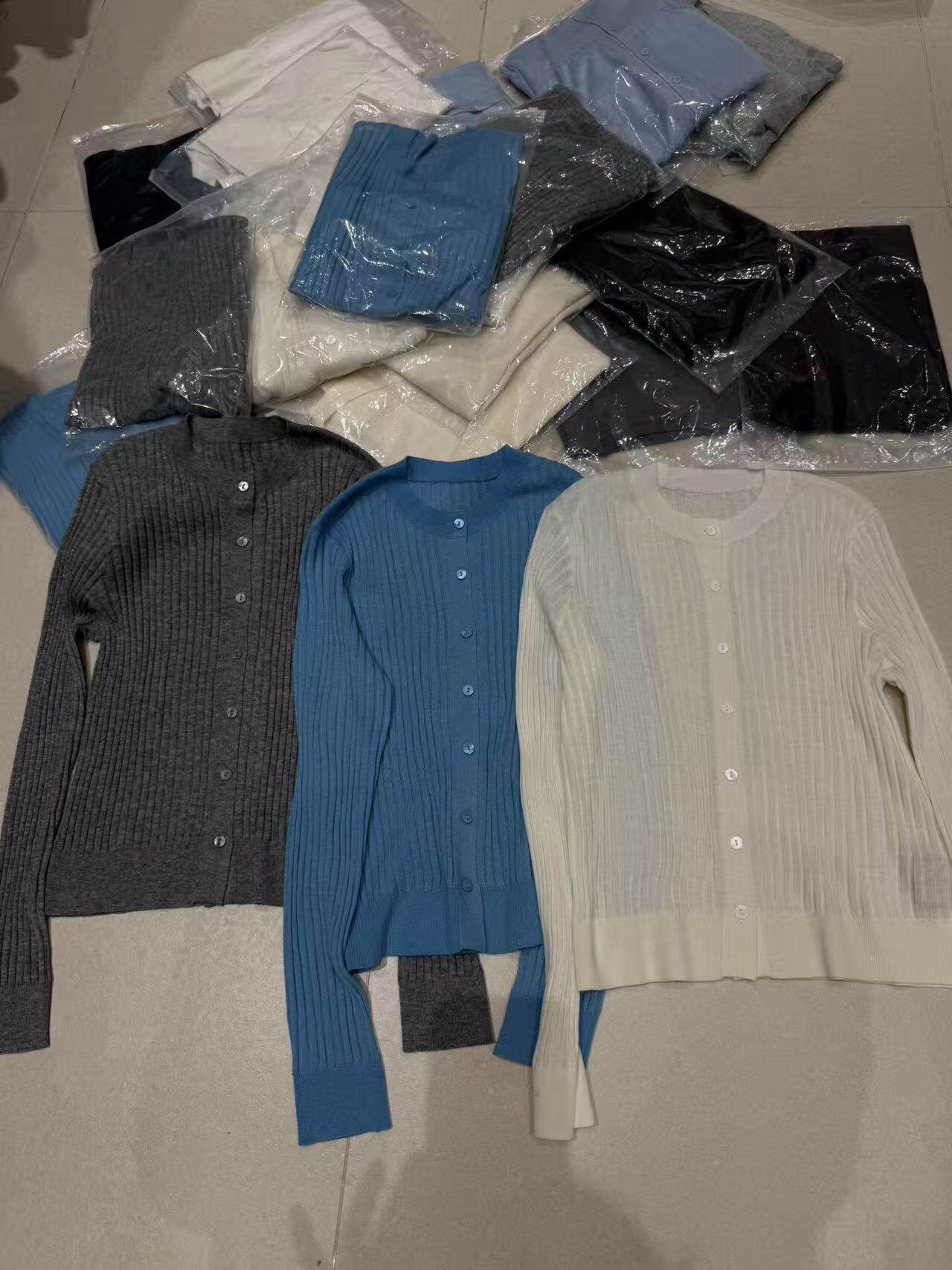 欧洲站2026春季新款欧货单排扣纯色简约百搭显瘦长袖针织开衫上衣