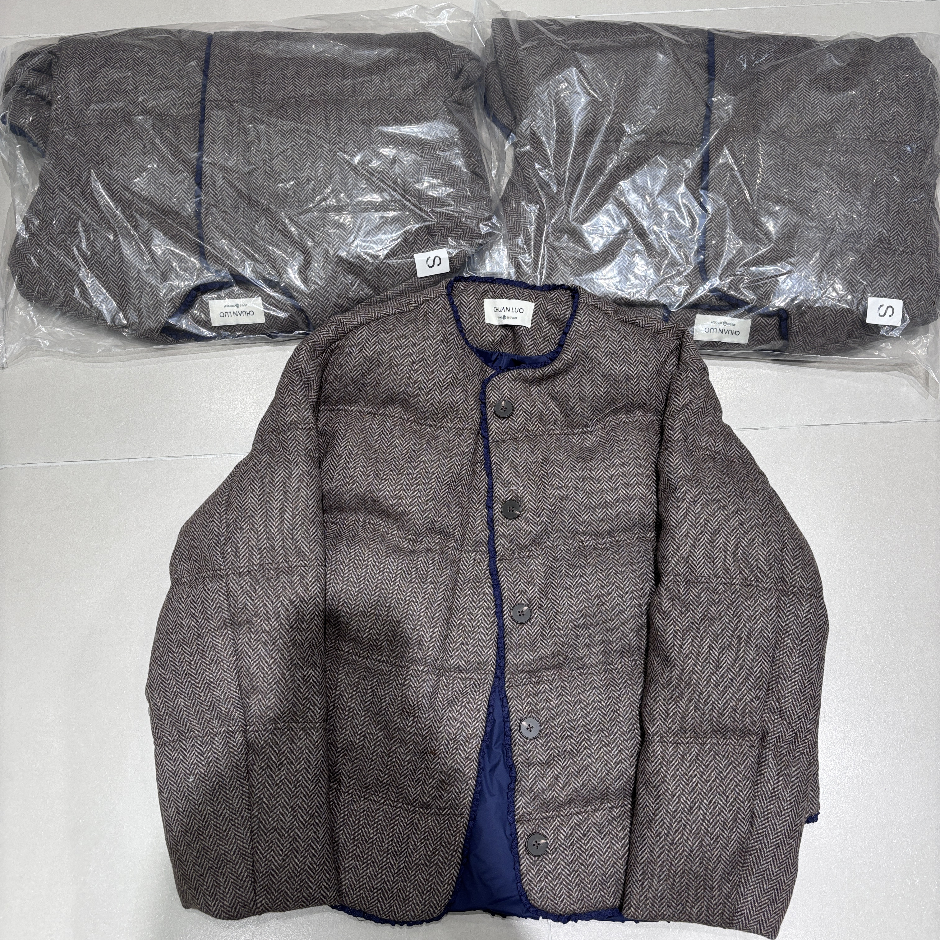 欧货时尚圆领人字纹羽绒服