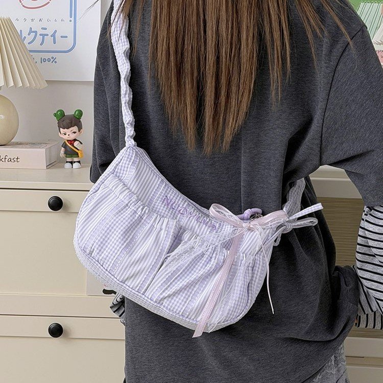 日系粉色格纹饺子包包女2026新款蝴蝶结抽绳褶皱单肩包手提腋下包